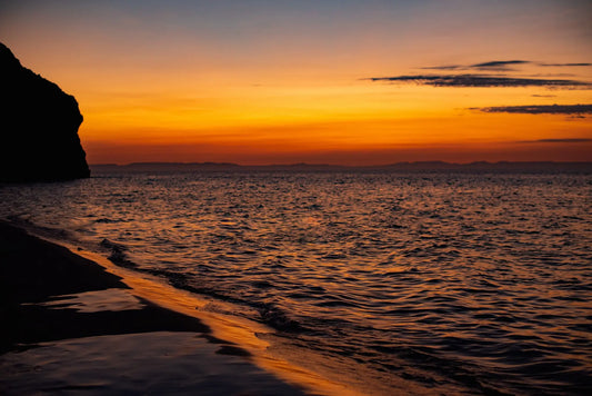 Vibrant orange and purple sunset over the Sea of Cortez in San José del Cabo,